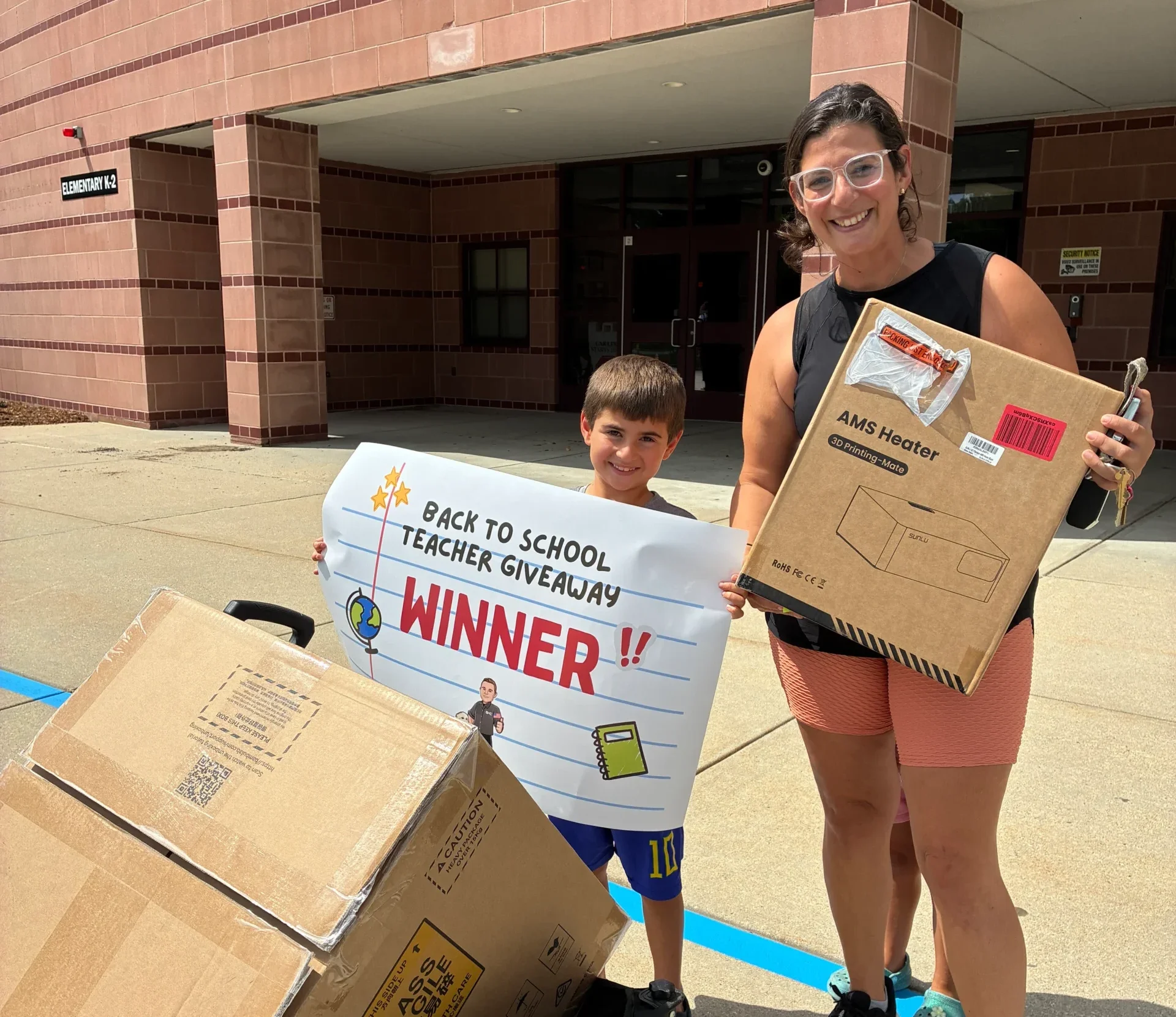 Back to school giveaway winner with child