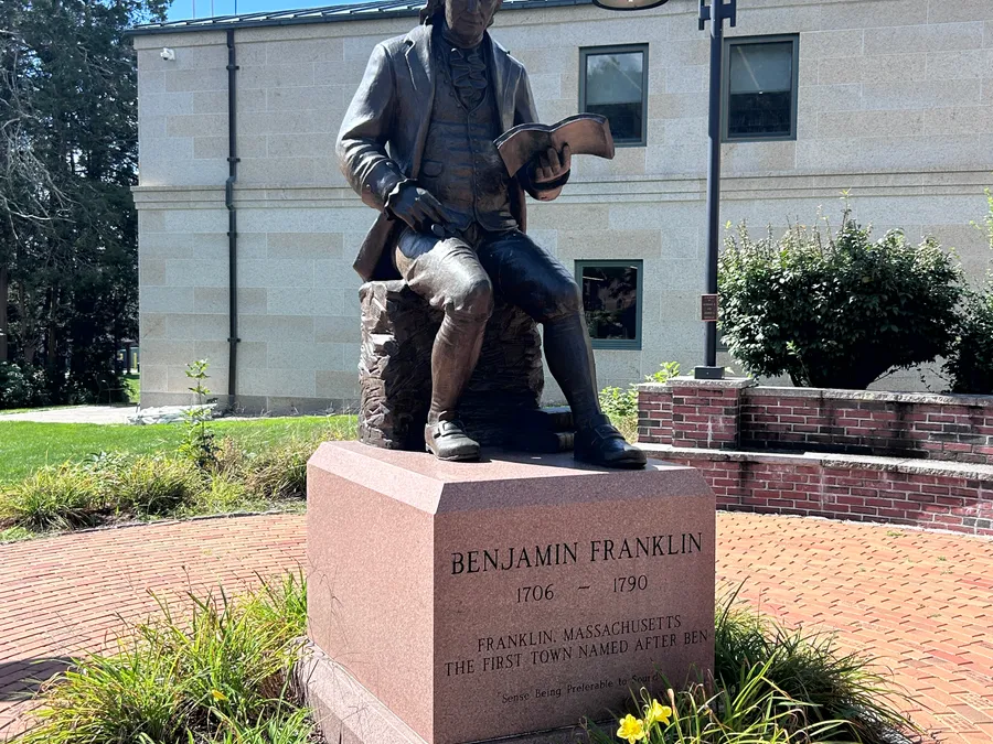 Benjamin Franklin statue outside Franklin Public Library in Franklin, MA.