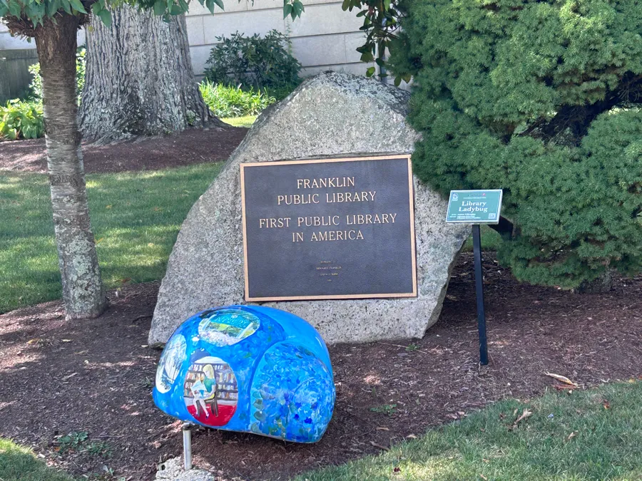 Plaque marking Franklin Public Library as the first public library in America, Franklin, MA.