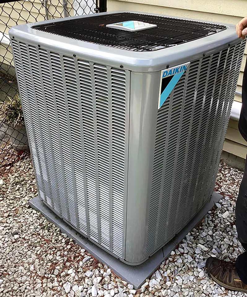 AC unit outside of residential home in Franklin, MA.