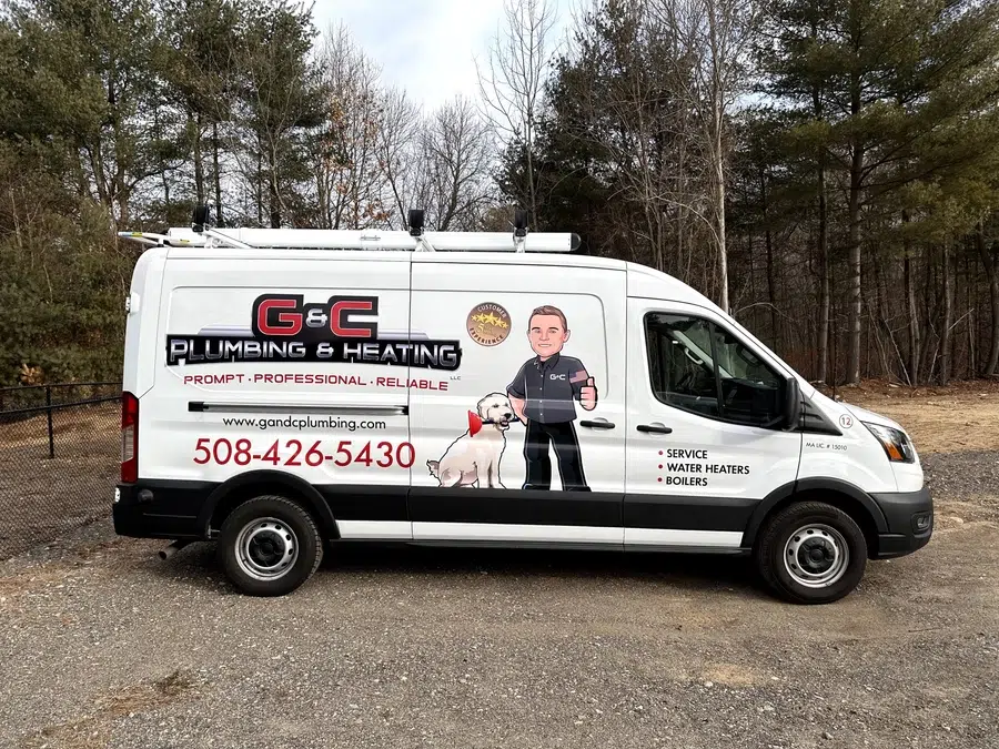 G&C Plumbing and Heating truck parked outside in wooded area of Franklin, MA.