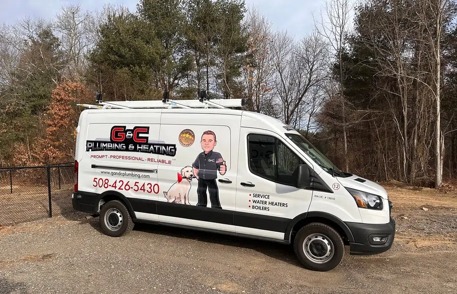 G&C Plumbing and Heating truck parked outside in wooded area of Franklin, MA.