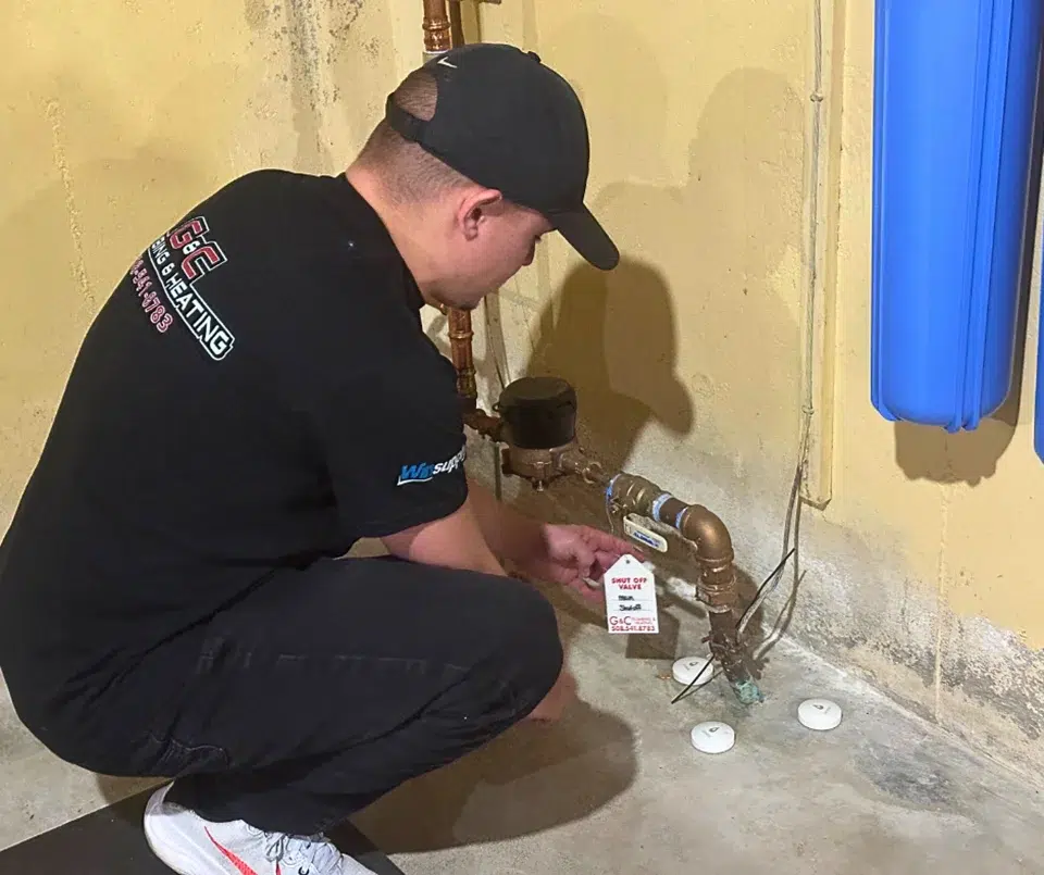 tech inspecting a water filtration pipe