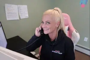 Customer service representative answering phone call for customer.